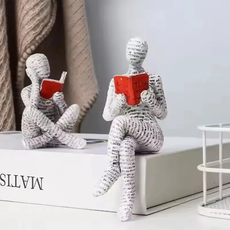 statue résine moderne statuette penseur lecture livre rouge orange noir