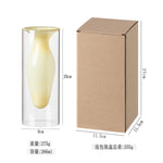 vase transparent goutte forme table arrangement floral rouge jaune vert pâle decoration intérieur