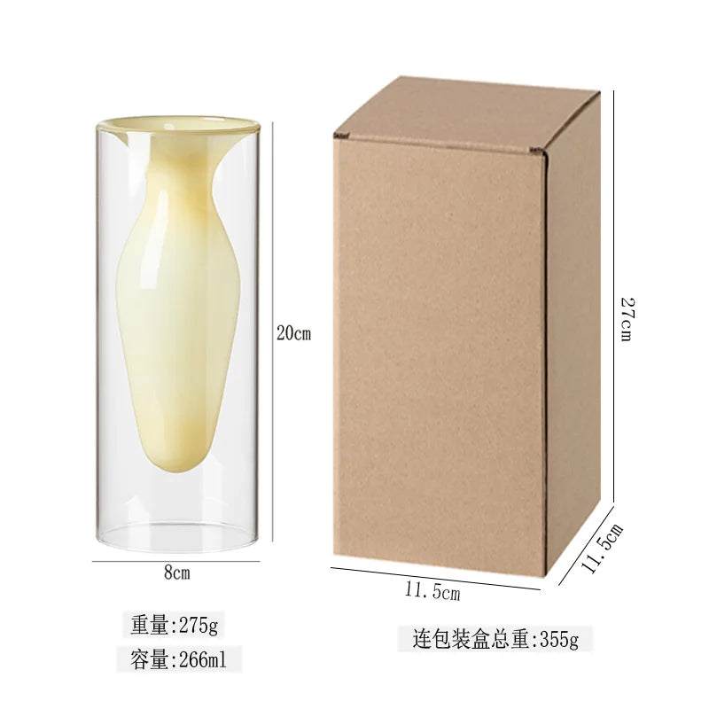 vase transparent goutte forme table arrangement floral rouge jaune vert pâle decoration intérieur