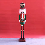 figurine soldat noel rouge blanche bleue dorée verte uniforme militaire couronne dorée moustache ruban