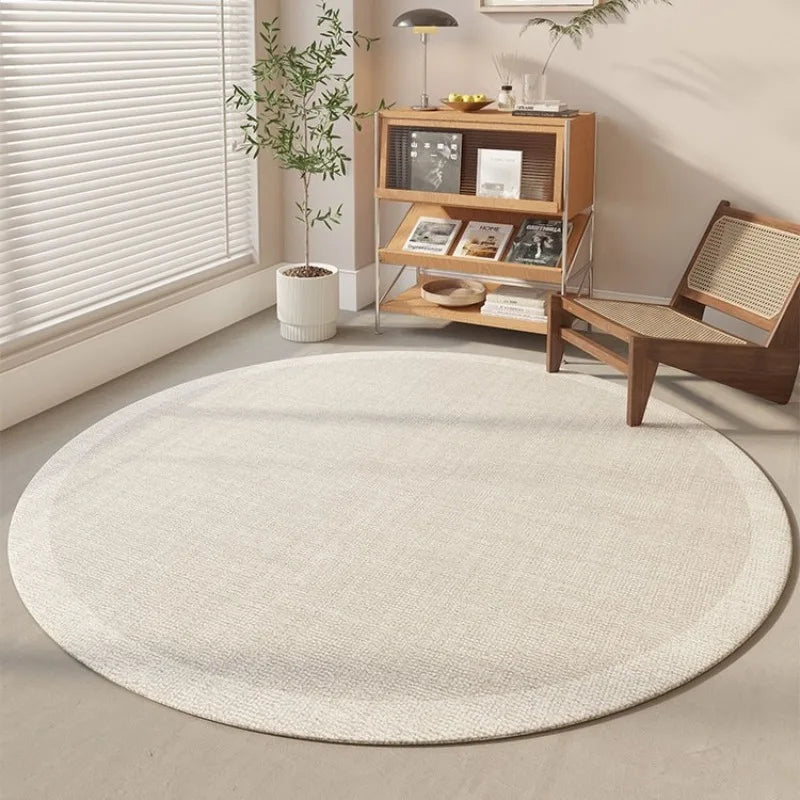 tapis rond beige clair texture tissée bordure blanche moderne décoration maison chambre salon