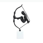 Sculpture moderne tête tête noir blanc socle pierre bouteille diffuseur livresscrição