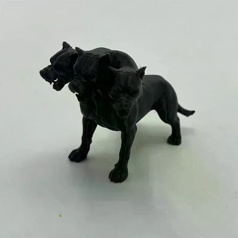 figurine chien trois têtes cerbère noire texture granuleuse mythologique fantastique