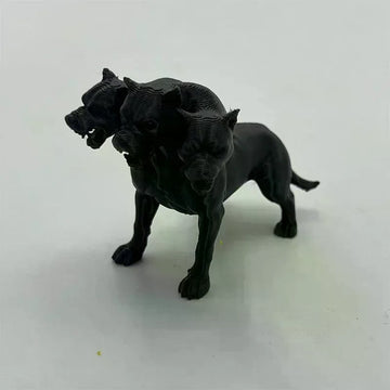 figurine chien trois têtes cerbère noire texture granuleuse mythologique fantastique