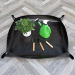 tapis jardinage noir moderne poignées pot plante graine outils arrosoir chiffon