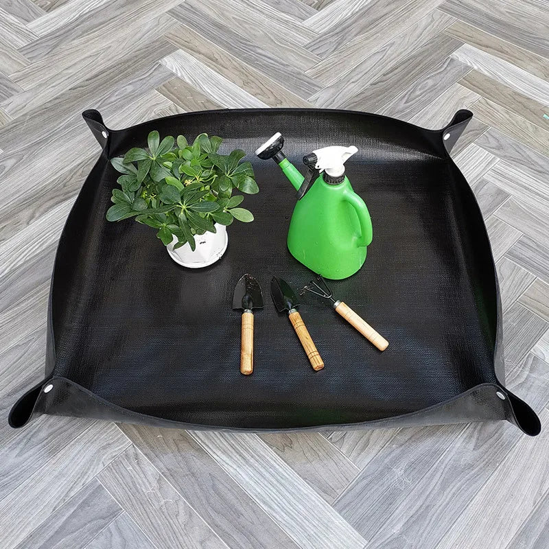 tapis jardinage noir moderne poignées pot plante graine outils arrosoir chiffon