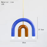 suspension lumineuse moderne arc forme géométrique rouge bleu noir blanc