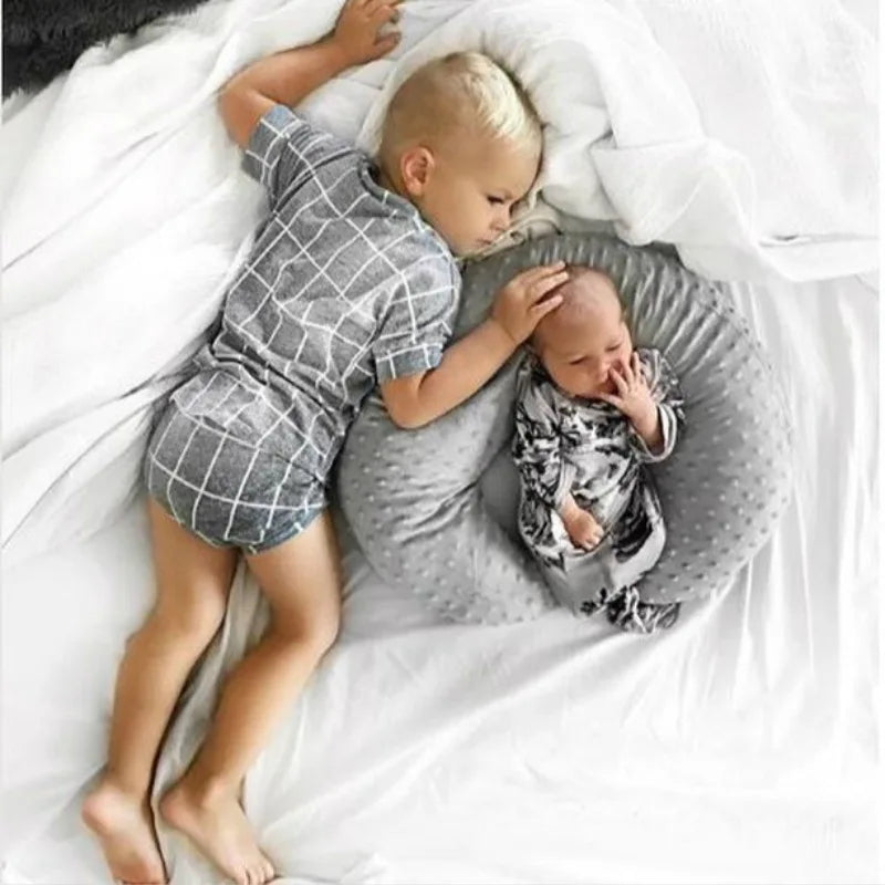 coussin portage bébé doux bleu clair gris rose pâle minky points quatre saisons confortable