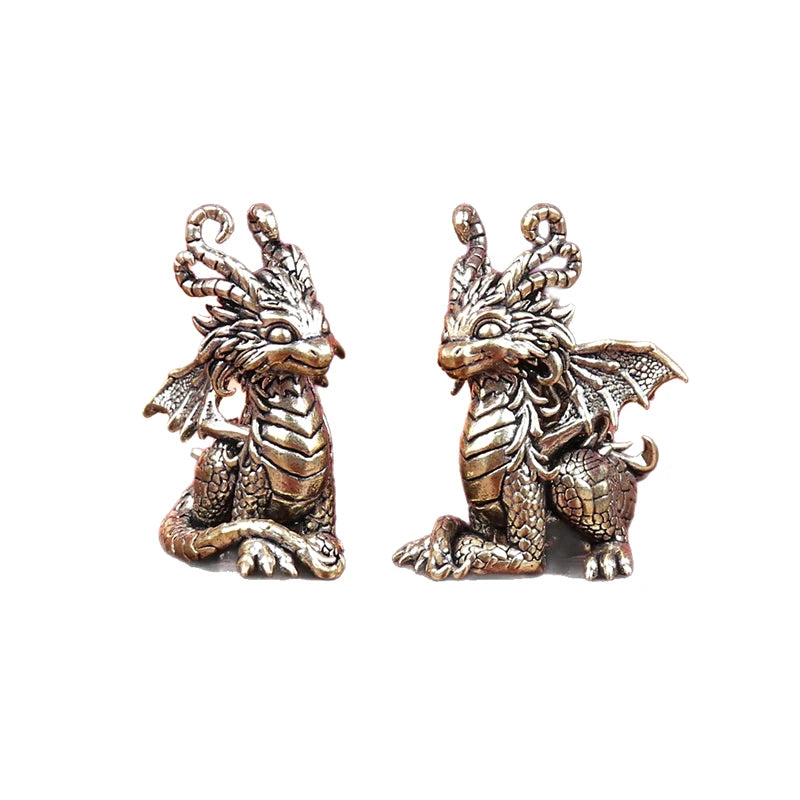 statues dragons dorées détaillées artisanales intérieur ornement métallique fantastique mythologie