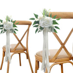 décoration mariage rose artificielle ruban eucalyptus feuilles verte chaise égliseextérieur