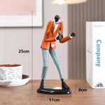 statues miniatures musiciens guitare saxophone trombone batterie décoration intérieure moderne stylisée