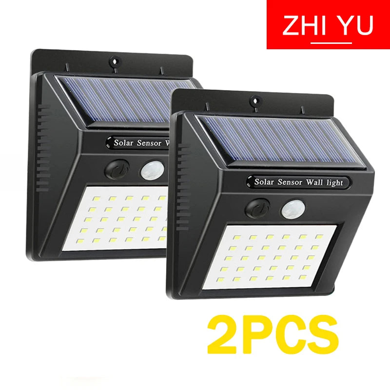 lampe solaire murale moderne noire ip65 induction led lithium batterie 1200mah fresnel oeilletsextérieur
