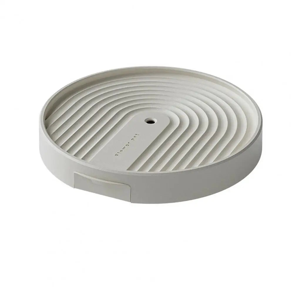 support plante roulettes collecte eau moderne gris clair rayures concentriquesversibleintérieur