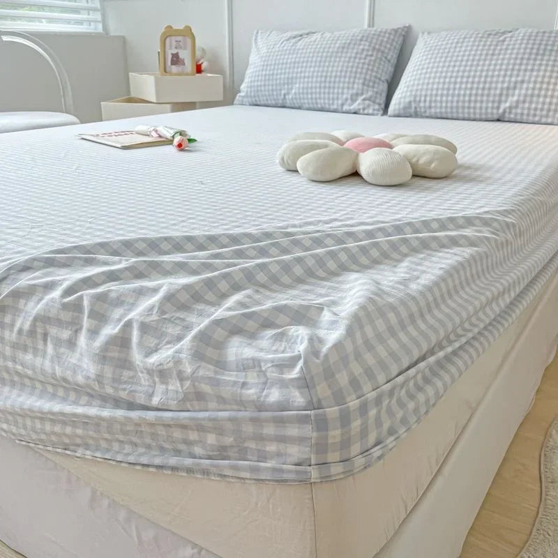protège matelas carreaux bleu clair gris clair rose clair jaune clair vert clair classique