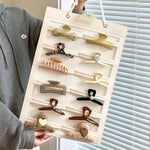 rangement mural blanc porte accessoires cheveux clips élastiques rubans décor modernes praticiens