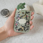 étui smartphone vintage floral blanc vert marron noir