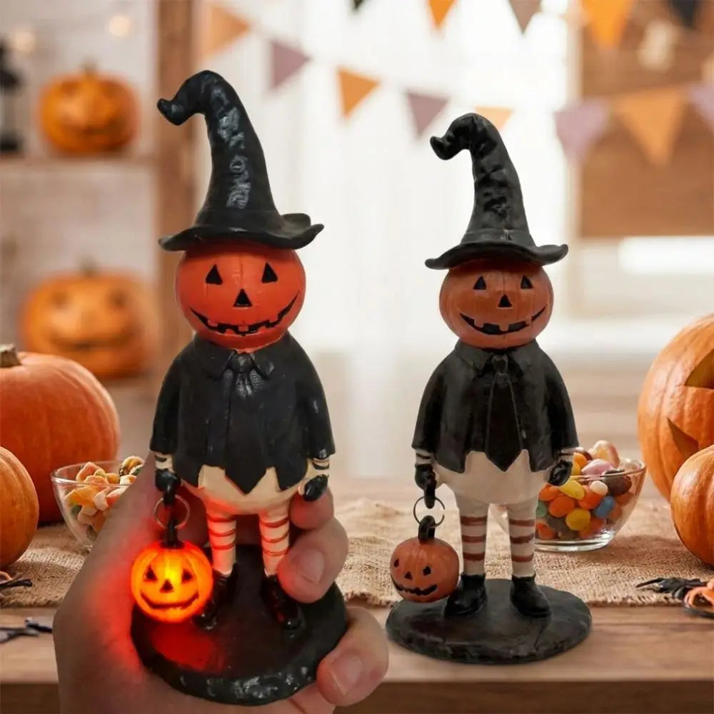 figurine halloween citrouille lumineuse orange visage chapeau robe noire bas rayés automne