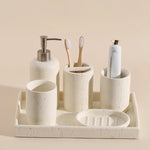 ensemble salle bain moderne brosse dents pot dentifrice distributeur savon blanc crème grain ciment
