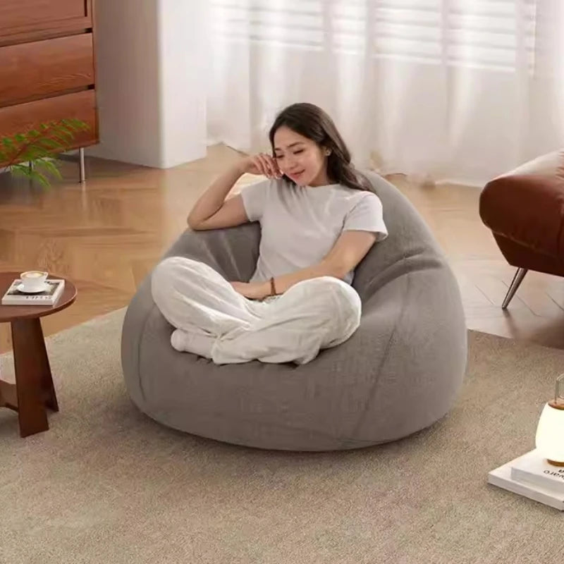 Pouf de sol en rotin orange