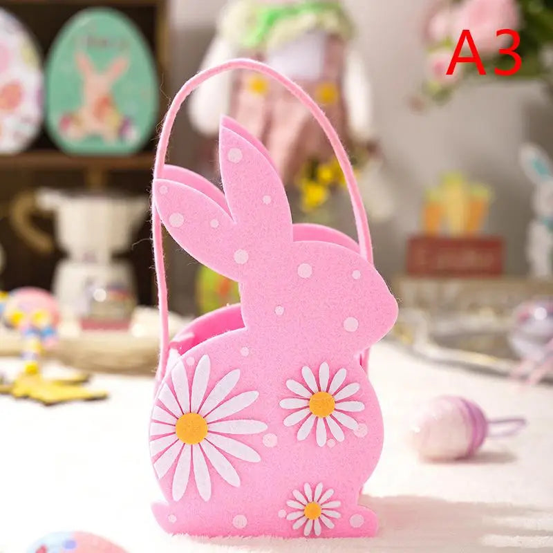 sac main forme lapin fleurs blanches taches noires couleurs vert rose bleu jaune pâques