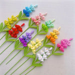 décoration intérieure multicolore fleurs tricotées artisanale jaune vert rose blanc violet tricot