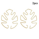 Support plante suspendu or moderne clips feuille monstera vert noir