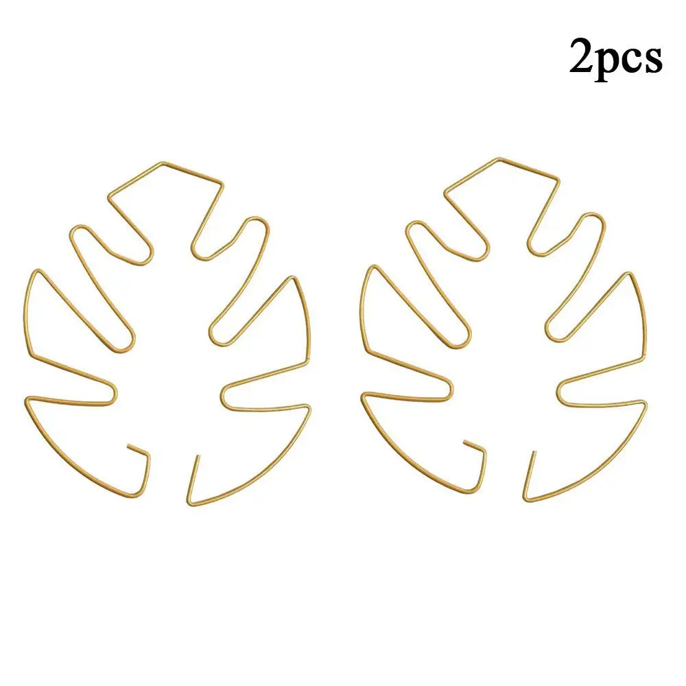 Support plante suspendu or moderne clips feuille monstera vert noir