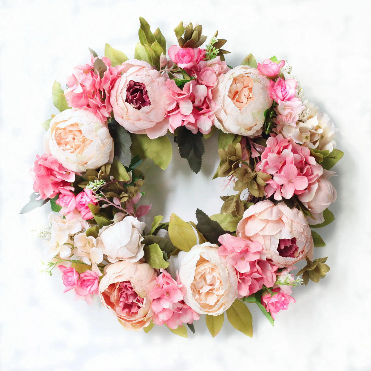 couronne florale vintage rose blanche feuilles vertes fleurs artificielles intérieur mariage table porte