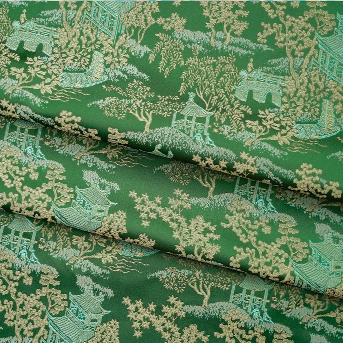 tissu brocart vert foncé motifs asiatiques semi transparent traditionnel décoration artisanale fleurs livre