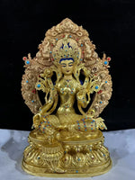 statue bouddhiste or bleu rouge turquoise décoration florale tibétain multiple bras base lotus