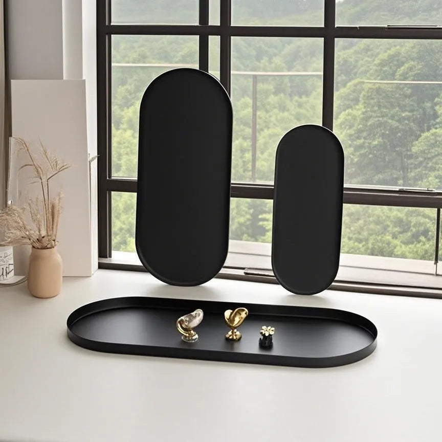 plateau ovale moderne noir mat bijoux parfum flacon lotion bougie calendrier decoration