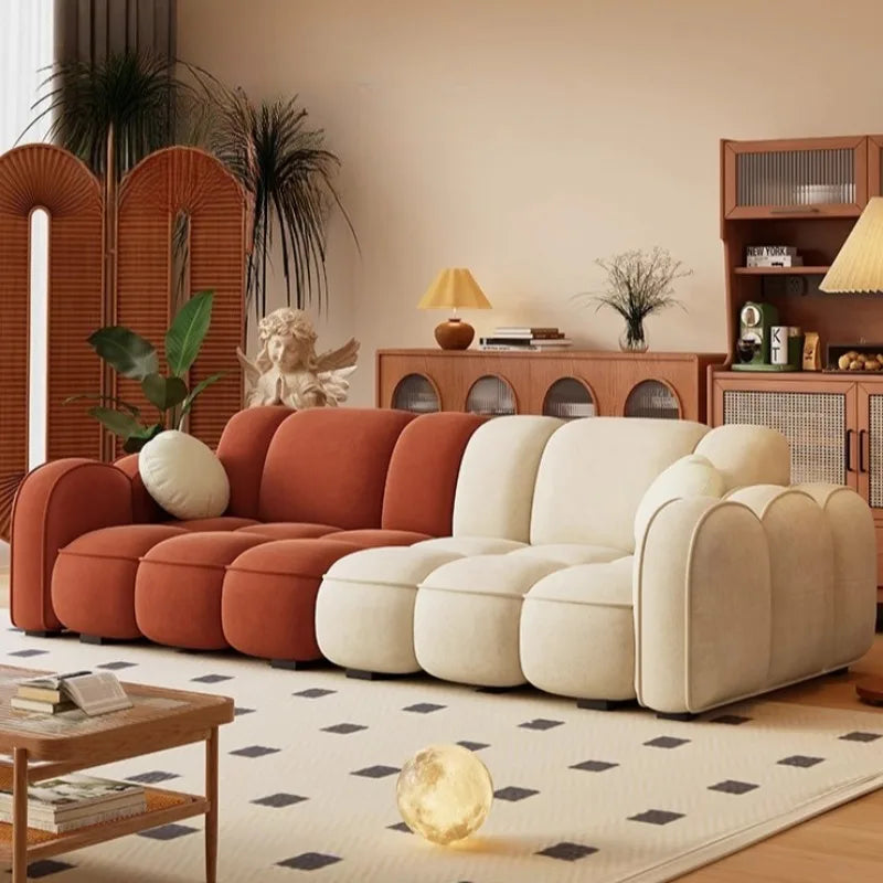 canapé d'angle moderne orange vert clair beige coussins contemporain minimaliste scandinave