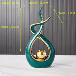 sculptures décoratives abstraites vase sphère noir doré vert émaillées modernes