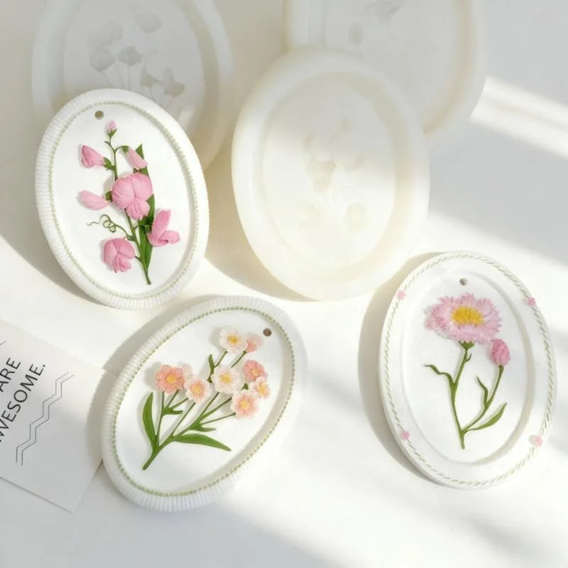 cadre décoratif ovale silicone fleurs reliefs artisanal clips ruban couleurs variées maison
