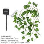 guirlande lumineuse solaire feuilles vertes lumières blanches moderne extérieur jardin terrasse festive