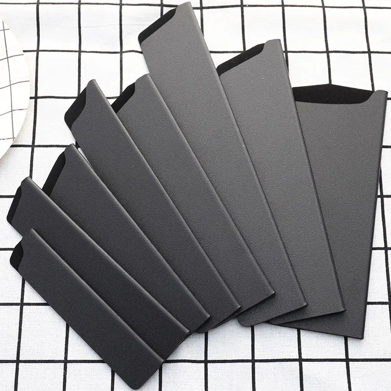 protège couteau noir adhésif durable moderne protection cuisine matériau métal