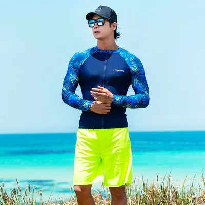 maillot surf homme polyester bleu marine feuilles vertes zip sportif moderne jaune fluo lunettes