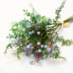 décoration intérieure bouquet artificiel feuilles vertes fleurs blanches jaunes roses naturel salon jardin