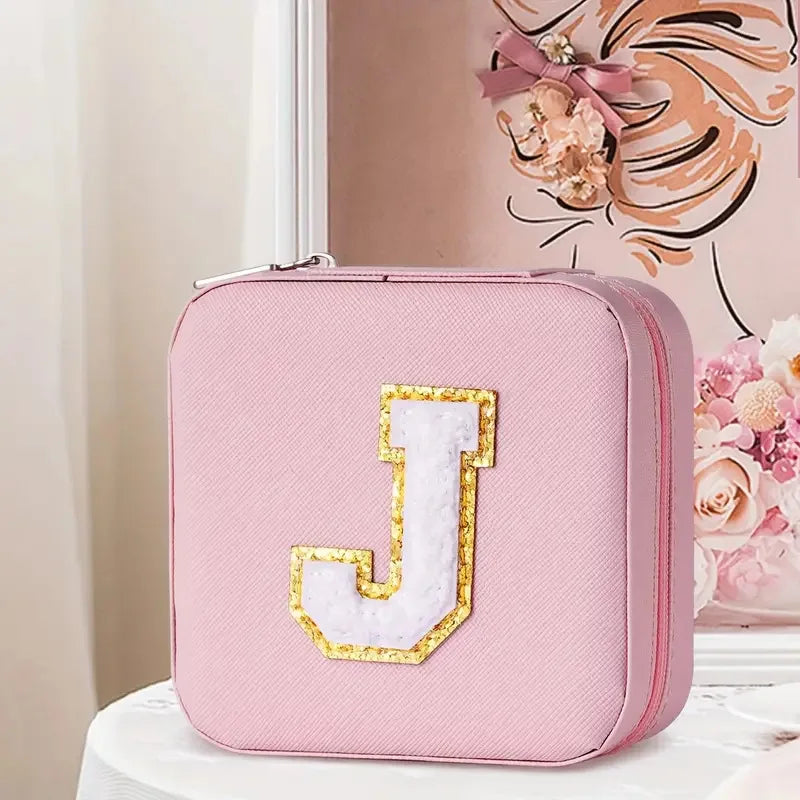 boîte bijoux cuir rose clair fermeture éclair voyage rangement bijoux