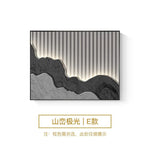 cadre mural contemporain noir montagne relief lignes lumineuses minimaliste fixations murales decoration interieur