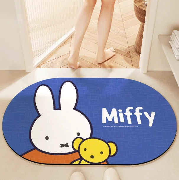 tapis bain dessin animé lapins gris jaune vert bleu rayures enfantin absorbant