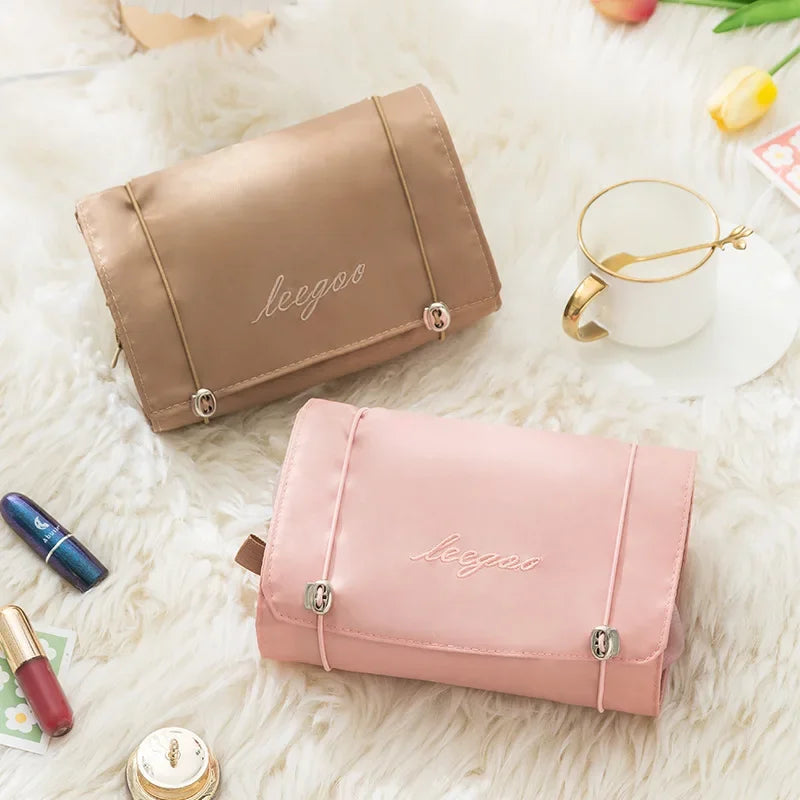 Sac cosmétiques multi usages pliable rose clair moderne poignée dorée fermeture glissière