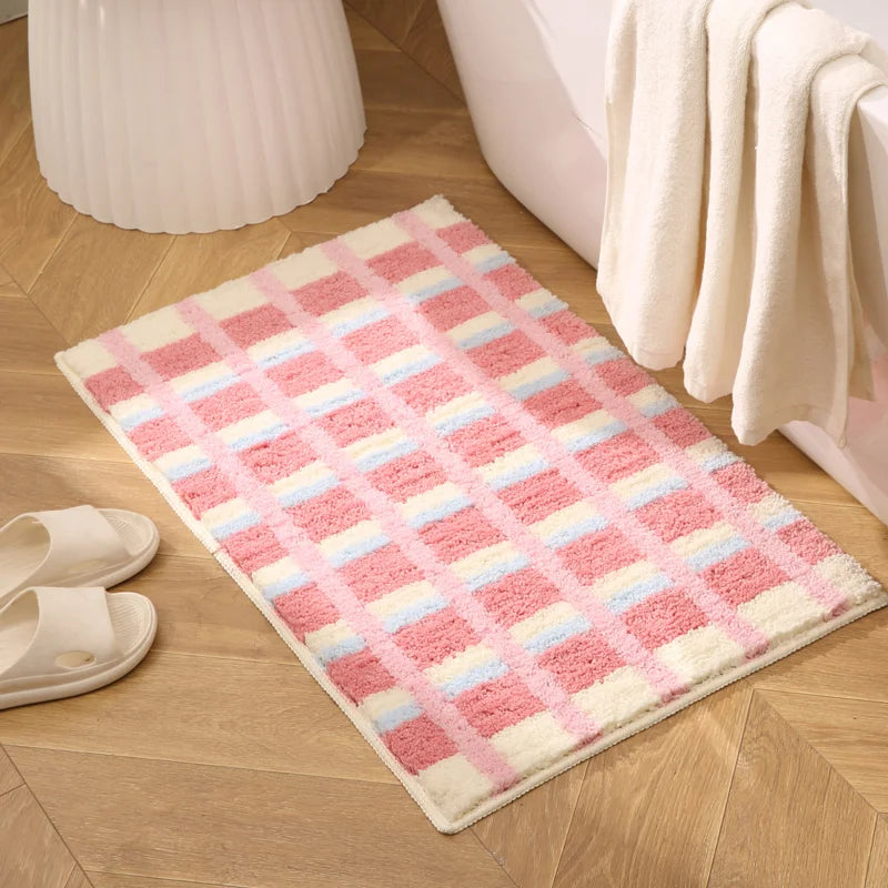 tapis bain absorbant moderne motif carreaux géométriques rose blanc salle bain