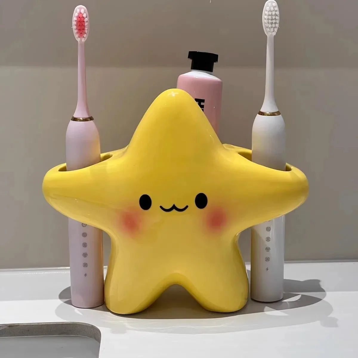 support kawaii étoile brosses dents électriques brosses jaune rose blanche flacon rose salle bain