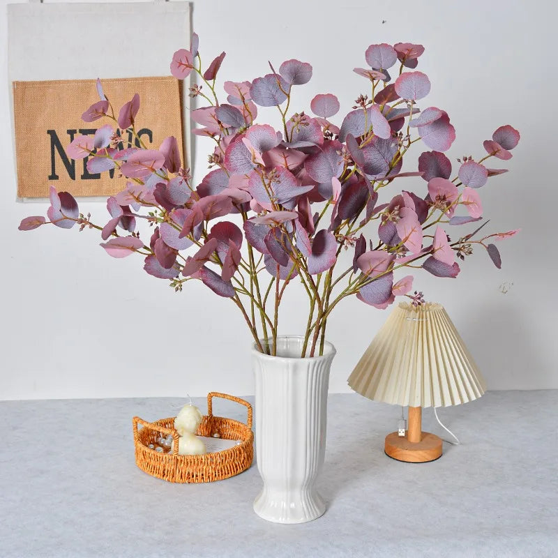 décoration intérieure branche artificielle feuilles ovales vert rose naturel minimaliste