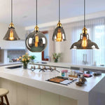 suspension lumineuse industrielle vintage ampoule filament verre transparent noir salon restaurant bar