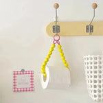support rouleau papier toilette moderne rondes rose bleu clair blanc 46cm anneaux métalliques salle