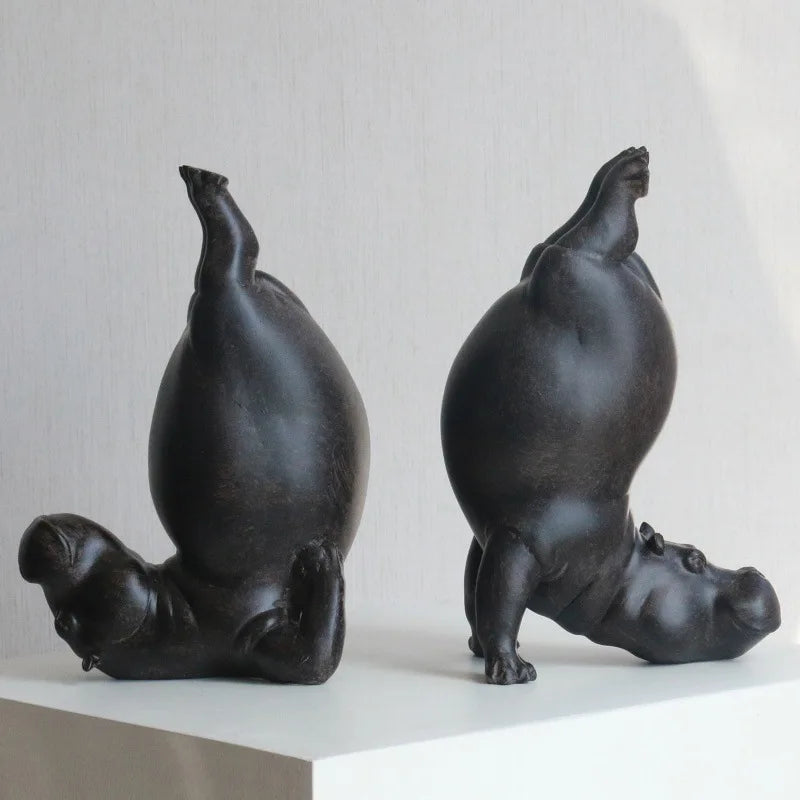 statues hippos noirs résine mat contemporain serre livres