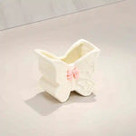 rangement mural papillon rose blanche brosses dents pinceaux maquillage deco girly fantaisiste