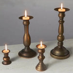 bougeoirs classiques bronze finement sculptés décoration maison vintage élégants fixations
